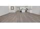Full open concept living area with kitchen in the background at 3706 Etendre Ct, Las Vegas, NV 89121