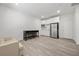 Spacious living area with modern kitchen features, ample seating, and lots of open floor space at 3706 Etendre Ct, Las Vegas, NV 89121