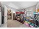 bedroom features a bunk bed, playful decor, and a window with plantation shutters at 3854 Stadium Ave, Las Vegas, NV 89120