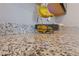 Close-up of a granite countertop with a fruit basket, showcasing the natural stone's texture and color variations at 3854 Stadium Ave, Las Vegas, NV 89120