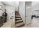 Open entryway featuring staircase, neutral walls, and easy access to a half bath at 3854 Stadium Ave, Las Vegas, NV 89120