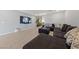 Inviting living room features stylish decor, modern lighting, and a large sectional sofa at 3854 Stadium Ave, Las Vegas, NV 89120