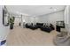 Large living room featuring modern tile flooring and a comfortable sectional sofa at 3854 Stadium Ave, Las Vegas, NV 89120