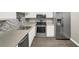 Updated kitchen featuring stainless steel appliances, a tiled backsplash, and modern cabinetry at 3930 University Center Dr # 603, Las Vegas, NV 89119