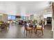 Bright living area with floor-to-ceiling windows and wood flooring at 3930 University Center Dr # 603, Las Vegas, NV 89119