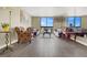 Spacious living room boasts wood floors, contemporary furnishings, and cityscape views at 3930 University Center Dr # 603, Las Vegas, NV 89119
