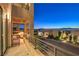 Enjoy stunning views from the balcony with outdoor seating and a grilling area at 414 Tranquil Peak Ct, Henderson, NV 89012