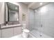 Modern bathroom boasts a glass-enclosed shower, contemporary vanity, and sleek fixtures at 414 Tranquil Peak Ct, Henderson, NV 89012