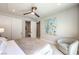 Comfortable bedroom featuring stylish furnishings and an en-suite bathroom at 414 Tranquil Peak Ct, Henderson, NV 89012
