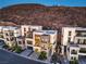 Stunning home exterior with balconies, modern design, and well-maintained landscaping at 414 Tranquil Peak Ct, Henderson, NV 89012
