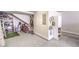 Garage interior with an epoxy floor for parking bikes and storing goods at 414 Tranquil Peak Ct, Henderson, NV 89012