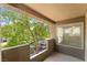 Relax on this balcony with wrought iron railings and a beautiful green tree view at 4400 S Jones Blvd # 2033, Las Vegas, NV 89103