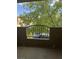 Cozy balcony with wrought iron railing and tree view at 4400 S Jones Blvd # 2033, Las Vegas, NV 89103