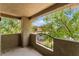 This inviting balcony offers a serene outdoor space with views of lush greenery at 4400 S Jones Blvd # 2033, Las Vegas, NV 89103