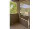 Balcony with window offering natural light and partial tree view at 4400 S Jones Blvd # 2033, Las Vegas, NV 89103
