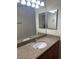 Bathroom featuring a large vanity, sink, mirror, and granite countertops at 4400 S Jones Blvd # 2033, Las Vegas, NV 89103