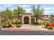 Elegant clubhouse featuring desert landscaping and a decorative concrete drive at 4400 S Jones Blvd # 2033, Las Vegas, NV 89103