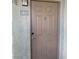 Neutral colored front door with house number 2033 at 4400 S Jones Blvd # 2033, Las Vegas, NV 89103