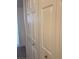 This hallway features a closet with multiple white doors and chrome knobs at 4400 S Jones Blvd # 2033, Las Vegas, NV 89103