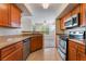 Well-lit kitchen with stainless steel appliances and a view into the adjacent living area at 4400 S Jones Blvd # 2033, Las Vegas, NV 89103
