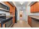 Efficient kitchen layout with stainless steel appliances and convenient access to bathroom at 4400 S Jones Blvd # 2033, Las Vegas, NV 89103