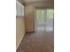 Cozy living room with neutral carpet and sliding glass doors at 4400 S Jones Blvd # 2033, Las Vegas, NV 89103
