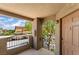 Charming porch area with wrought iron railing and a view of the neighborhood at 4400 S Jones Blvd # 2033, Las Vegas, NV 89103