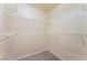 Walk-in closet with wire shelving and neutral walls, offering ample storage space at 4400 S Jones Blvd # 2033, Las Vegas, NV 89103