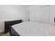 Well-lit bedroom with bed, dresser, carpet and closet space at 485 Pebble Run Ave, Henderson, NV 89011