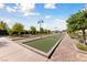 Professionally designed bocce ball court with manicured landscaping and scenic surroundings at 485 Pebble Run Ave, Henderson, NV 89011
