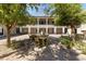 Inviting courtyard with outdoor seating, beautiful landscaping, and a serene fountain at 485 Pebble Run Ave, Henderson, NV 89011