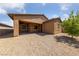Attractive single-story home with low-maintenance landscaping and a covered patio at 485 Pebble Run Ave, Henderson, NV 89011