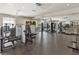 Well-equipped gym with modern exercise machines and mirrored walls, perfect for fitness enthusiasts at 485 Pebble Run Ave, Henderson, NV 89011