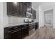 Gourmet kitchen boasting stainless steel appliances, granite countertops, and ample cabinet space at 485 Pebble Run Ave, Henderson, NV 89011