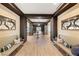 Elegant lobby area with comfortable seating, stylish decor, and a welcoming ambiance at 485 Pebble Run Ave, Henderson, NV 89011
