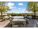 Inviting outdoor space with ample seating, lush greenery, and a tranquil ambiance at 485 Pebble Run Ave, Henderson, NV 89011