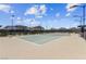 Well-maintained tennis court, surrounded by lush greenery, offering an active lifestyle within the community at 485 Pebble Run Ave, Henderson, NV 89011