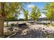 Well-maintained tennis courts surrounded by lush greenery, offering a great recreational space at 485 Pebble Run Ave, Henderson, NV 89011