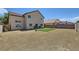 Expansive backyard with potential for customization, bordered by privacy fencing at 5502 Cinnamon Ave, Las Vegas, NV 89122