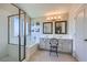 Bright bathroom with a soaking tub, glass shower, and double vanity at 5502 Cinnamon Ave, Las Vegas, NV 89122