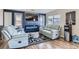 Comfortable living room featuring a fireplace, TV, and contemporary decor at 5502 Cinnamon Ave, Las Vegas, NV 89122