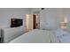 Inviting main bedroom with soft bedding, modern dresser, and stylish lamp creating a relaxing retreat at 6436 Deadwood Rd, Las Vegas, NV 89108