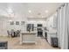 Charming kitchen featuring stainless steel appliances, granite countertops, and a cozy breakfast nook at 6525 Raven Hall St, North Las Vegas, NV 89084