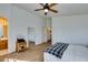 This spacious main bedroom has plenty of closet space and neutral colored carpet at 6549 Clara Bow Ave # 103, Las Vegas, NV 89122