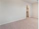 Bedroom featuring neutral carpet and an entrance to the walk-in closet at 7083 Seat Wall Rd, Las Vegas, NV 89148