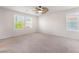 Bedroom featuring ceiling fan and windows at 7083 Seat Wall Rd, Las Vegas, NV 89148
