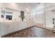 Bright bathroom features dual sinks, large mirror and glass shower stall at 7107 Calvert Cliffs St, North Las Vegas, NV 89084