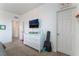 Spacious bedroom with a dresser and lots of natural light at 7107 Calvert Cliffs St, North Las Vegas, NV 89084