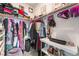 Walk-in closet complete with shelves, hanging racks, and ample storage space at 7107 Calvert Cliffs St, North Las Vegas, NV 89084