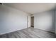 Bright bedroom features a neutral color palette and contemporary wood-look flooring at 745 N Royal Crest Cir # 141, Las Vegas, NV 89169